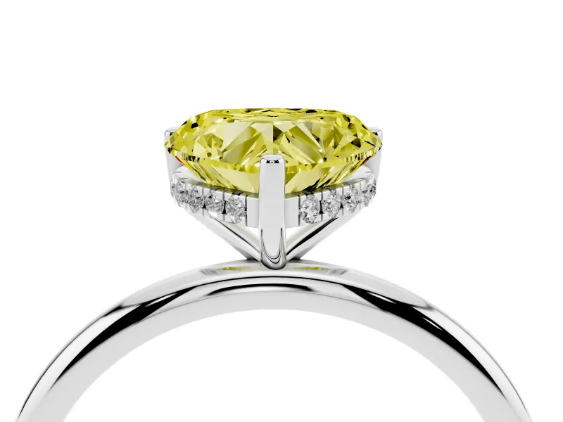 Fancy Yellow Heart Cut Diamond Solitaire Engagement Ring Set in White gold with Prong Setting and Polished Band