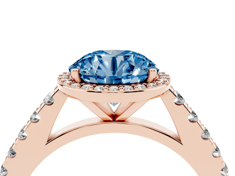 Fancy Blue Round Cut Diamond Halo Engagement Ring Set in Rose gold with Pavé Band and Prong Setting