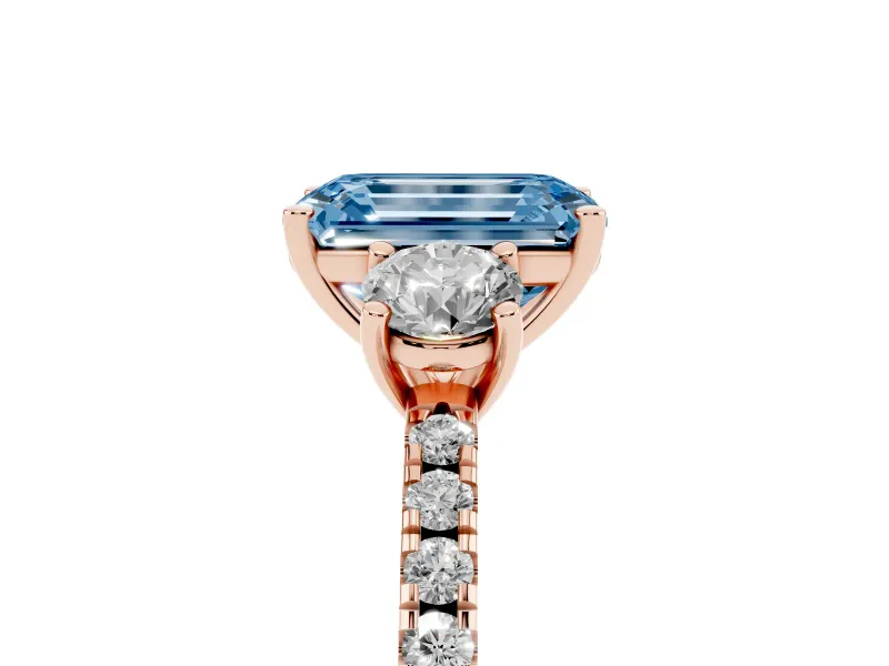 Emerald Cut Three Stone Engagement Ring Setting for a Fancy Blue Lab-Grown Diamond | Pave Shoulders | Rose Gold
