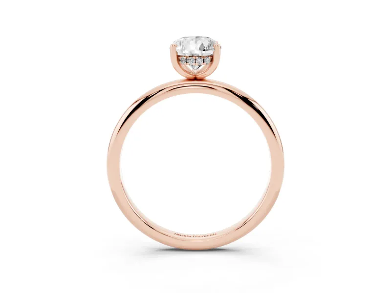 Pear Cut Diamond Solitaire Engagement Ring Set in Rose gold with Prong Setting and Polished Band