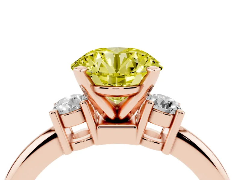 Fancy Yellow Three-Stone Round Cut Diamond Ring Set in Rose gold with Prong Setting and Plain Band
