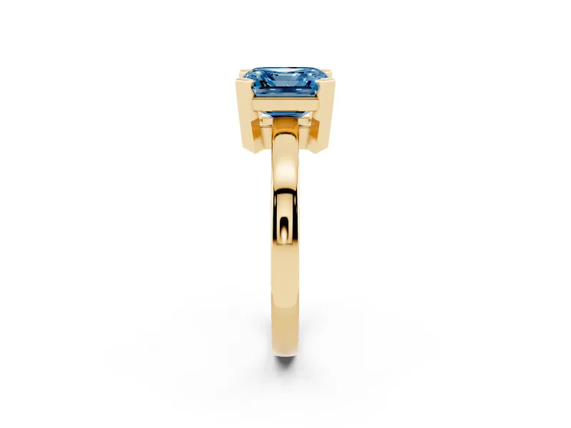Fancy Blue Asscher Cut Diamond Solitaire Ring Set in Yellow gold with Prong Head and Smooth Polished Band