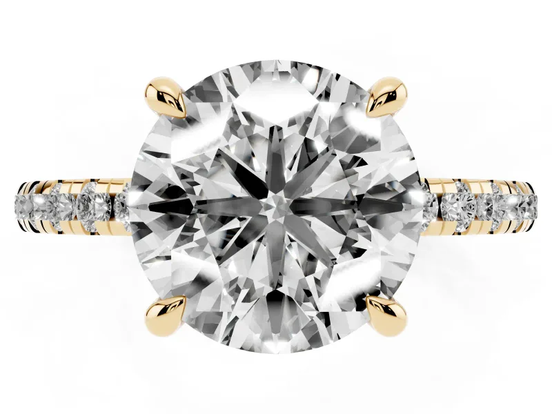 Round Cut Diamond Brilliant Solitaire Ring Set in Yellow gold with Pavé Band and Prong Setting
