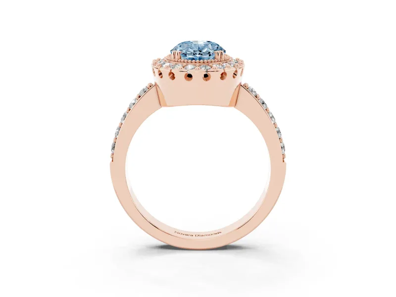 Fancy Blue Oval Cut Diamond Halo Ring Set in Rose gold with Pavé Shank and Prong Setting