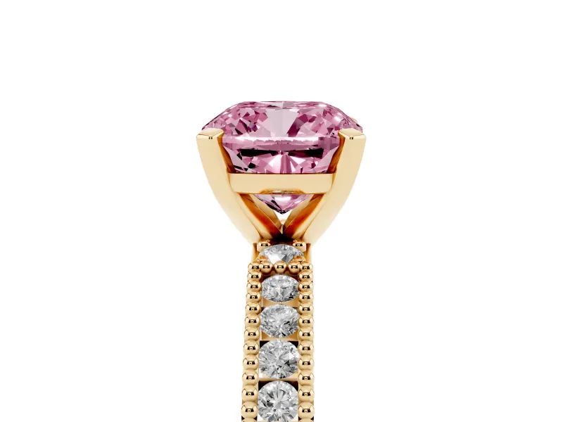 Fancy Pink Cushion Cut Diamond Solitaire Ring Set in Yellow gold with Slim Pavé Band and Prong Setting