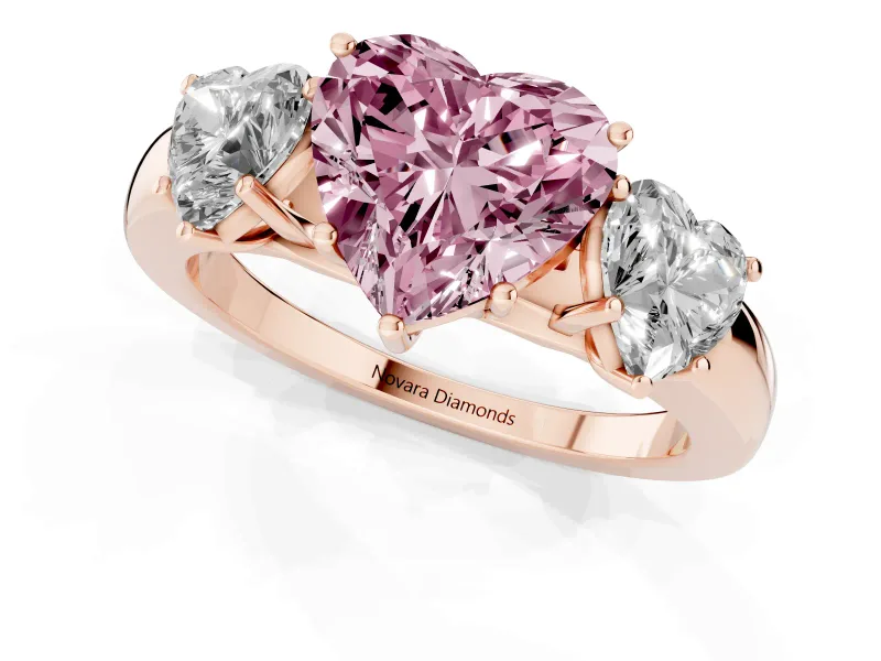 Fancy Pink Heart Cut Diamond Three-Stone Ring Set in Rose gold with Bold Center and Classic Band