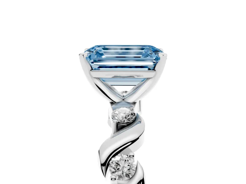 Fancy Blue Emerald Cut Diamond Solitaire Ring Set in Platinum with Ribbon Twist Band, Round Accents and Prong Setting