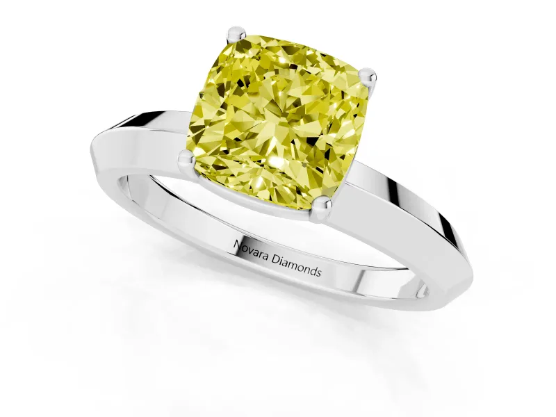 Fancy Yellow Cushion Cut Diamond Solitaire Engagement Ring Set in White gold with Flat Band and Prong Setting
