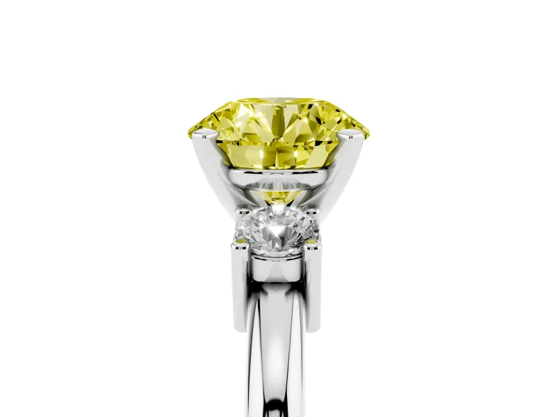 Fancy Yellow Three-Stone Round Cut Diamond Ring Set in White gold with Prong Setting and Plain Band