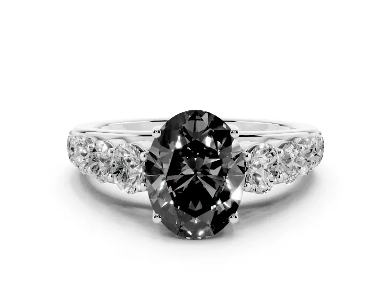 Fancy Black Oval Cut Diamond Solitaire Ring Set in White gold with Pavé-Set Band and Prong Setting
