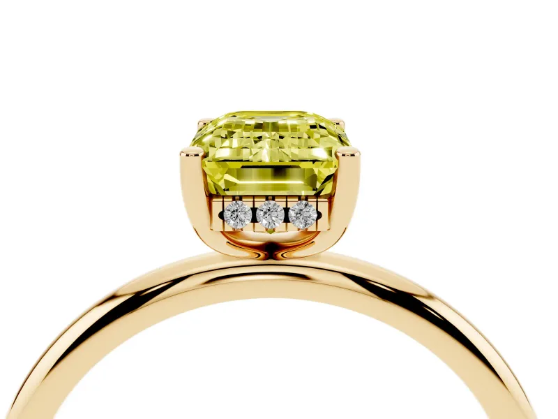 Fancy Yellow Emerald Cut Diamond Solitaire Engagement Ring Set in Yellow gold with Prong Setting and Polished Band