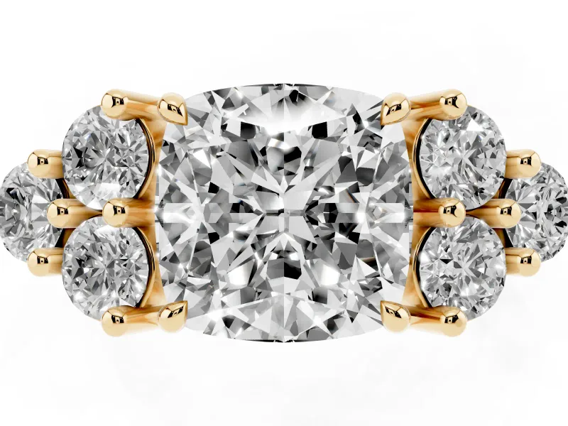 Cushion Cut Diamond Solitaire Ring Set in Yellow gold with Cluster Accents on Each Side