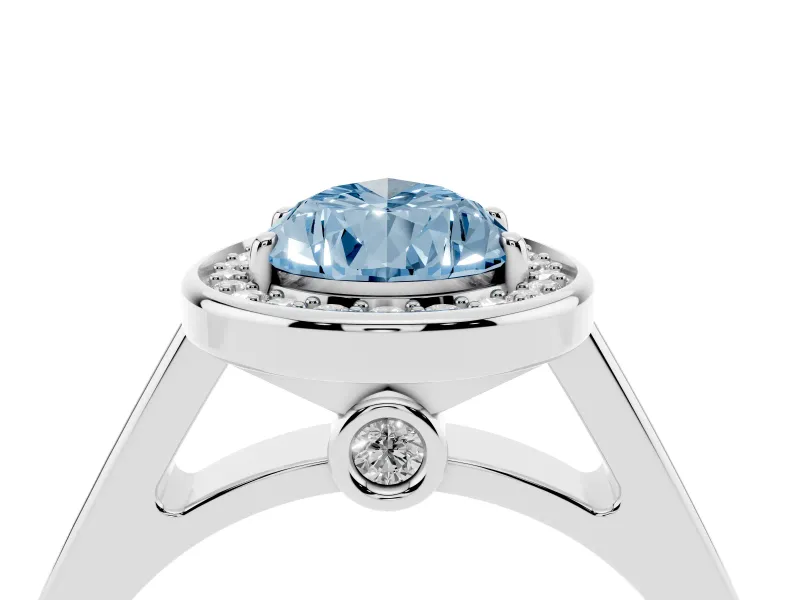 Fancy Blue Pear Cut Diamond Halo Solitaire Ring Set in White gold with Pavé Band and Bezel Setting