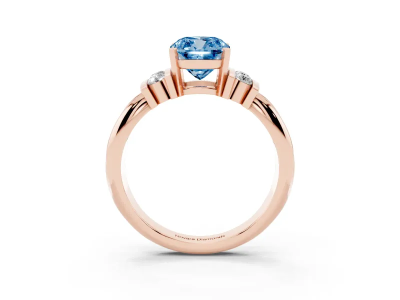 Fancy Blue Three-Stone Cushion Cut Diamond Channel Set Ring Set in Rose gold with Bar Prongs