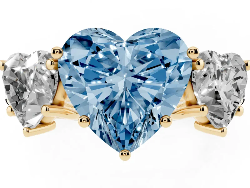 Fancy Blue Heart Cut Diamond Three-Stone Ring Set in Yellow gold with Pavé Band