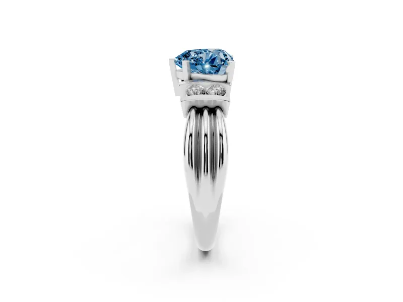 Fancy Blue Three-Stone Heart Cut Diamond Channel Set Ring Set in White gold with Bar Prongs