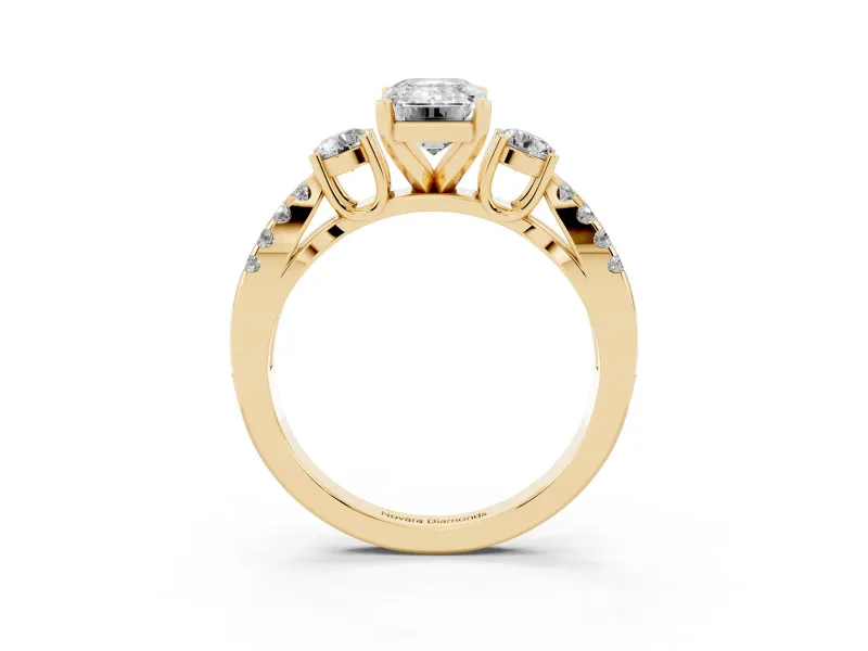 Emerald Cut Diamond Three-Stone Ring Set in Yellow gold with Pavé Split Shank and Prong Setting