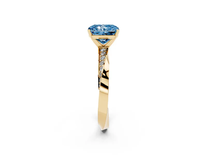 Fancy Blue Radiant Cut Diamond Engagement Ring Set in Yellow gold with Side Stone Accents and Prong Setting