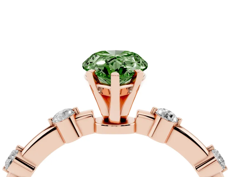 Fancy Green Pear Cut Diamond Solitaire Ring Set in Rose gold with Bezel Set Side Stones and Prong Setting