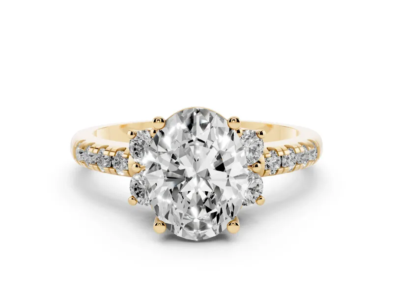 Oval Cut Diamond Three-Stone Pavé Ring Set in Yellow gold with Prong Setting