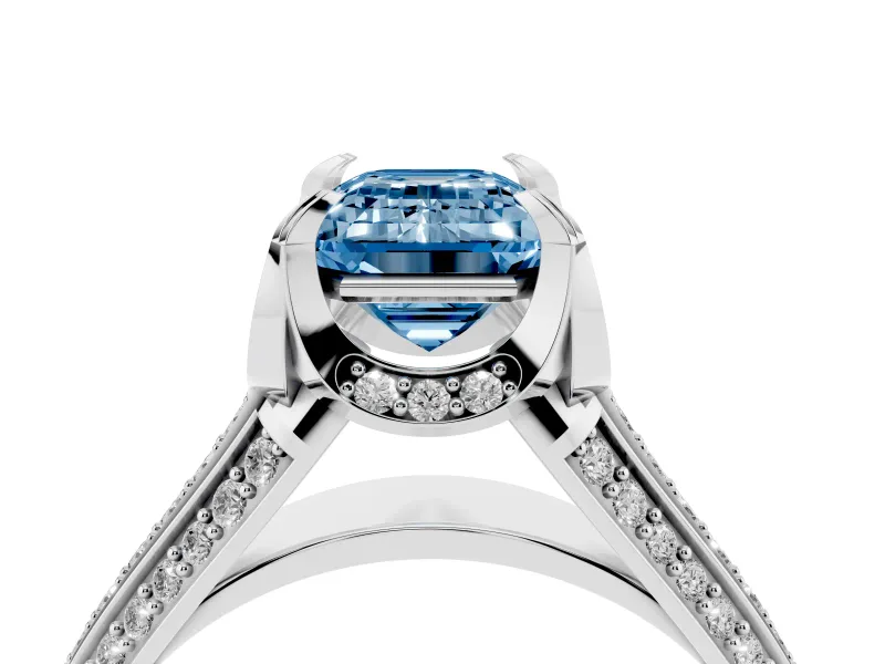 Fancy Blue Emerald Cut Diamond Pavé Split Shank Solitaire Ring Set in White gold with Prong Setting