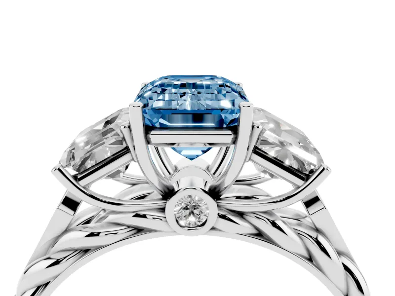 Fancy Blue Emerald Cut Diamond Three-Stone Ring Set in Silver with Braided Band