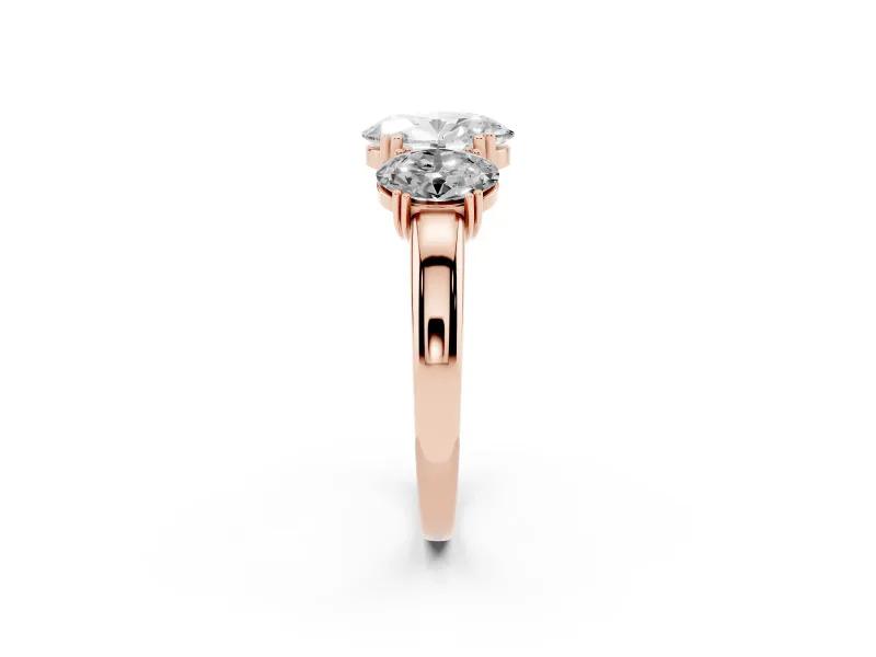 Oval Cut Diamond Three-Stone Ring Set in Rose gold with Polished Band and Prong Setting