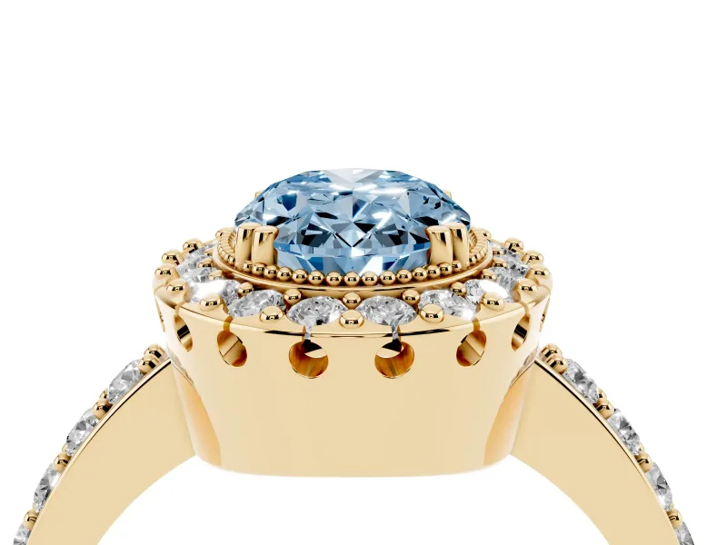 Fancy Blue Oval Cut Diamond Halo Ring Set in Yellow gold with Pavé Shank and Prong Setting