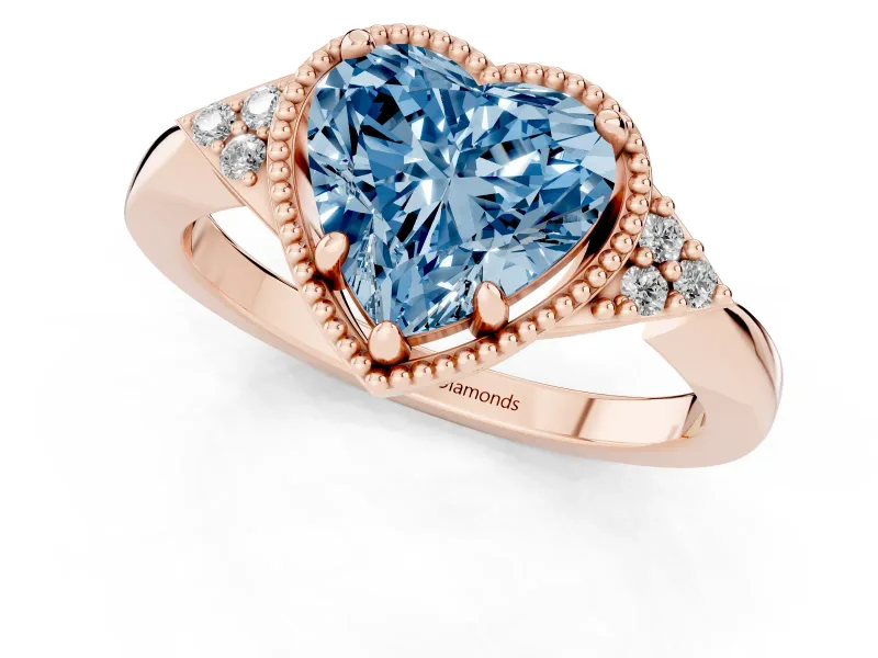 Fancy Blue Heart Cut Diamond Milgrain Solitaire Ring Set in Rose gold with Tapered Pavé Band and Prong Setting