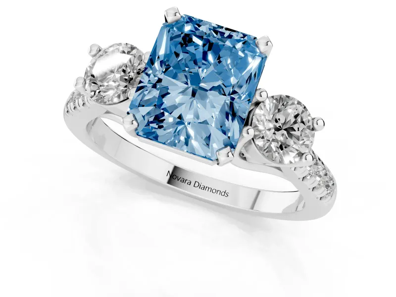 Fancy Blue Three-Stone Radiant Cut Diamond Pavé Band Ring Set in Silver with Prong-Set Trio