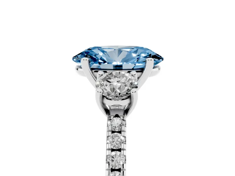 Fancy Blue Oval Cut Diamond Three-Stone Ring Set in Silver with Pavé Band and Graduated Sides
