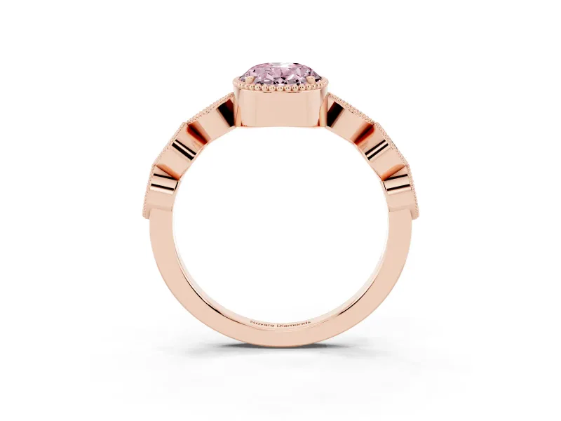 Fancy Pink Oval Cut Diamond Vintage-Inspired Milgrain Ring Set in Rose gold with Marquise Stations of Round Accents