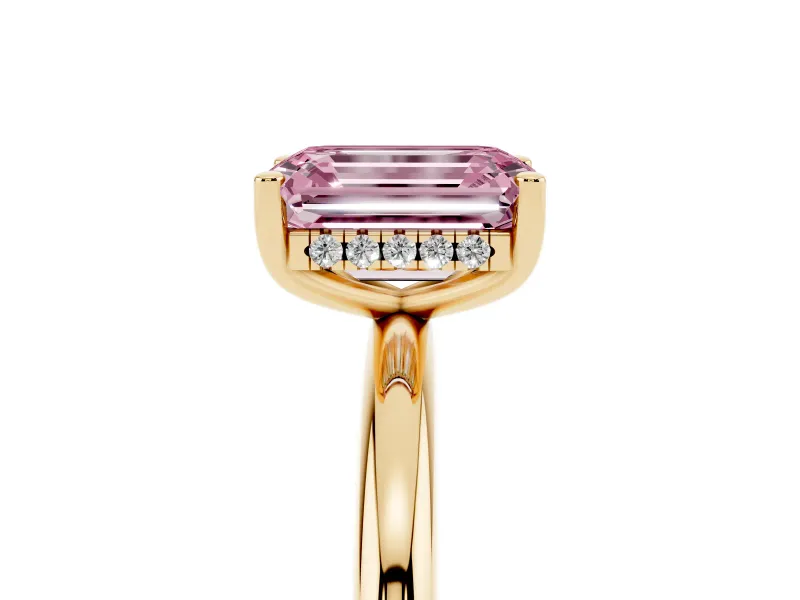 Fancy Pink Emerald Cut Diamond Solitaire Engagement Ring Set in Yellow gold with Prong Setting and Polished Band