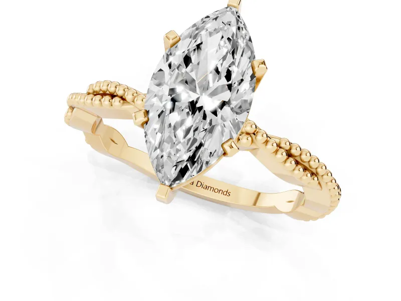 Marquise Cut Diamond Solitaire Ring Set in Yellow gold with Twisted Band and Bead Prong Setting