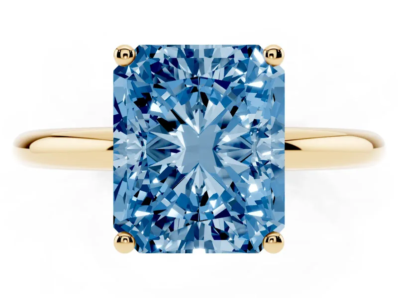 Fancy Blue Radiant Cut Diamond Solitaire Engagement Ring Set in Yellow gold with Prong Setting and Polished Band
