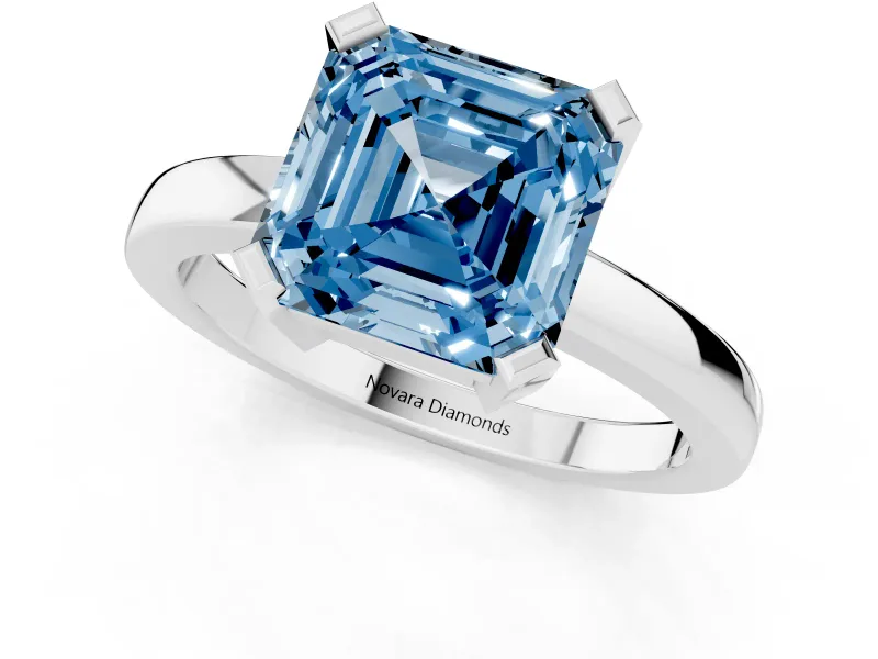 Fancy Blue Asscher Cut Diamond Solitaire Ring Set in White gold with Prong Head and Smooth Polished Band