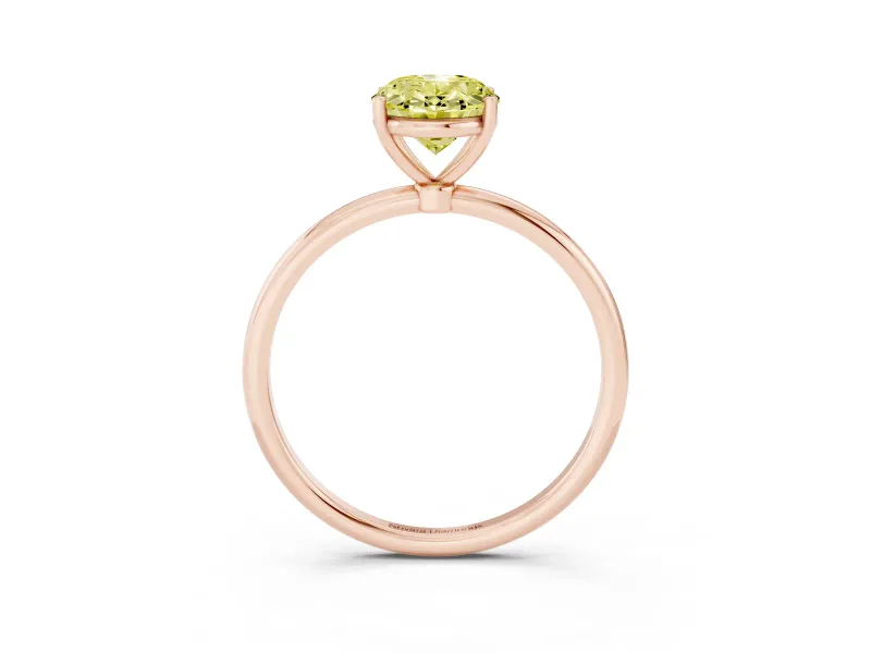 Fancy Yellow Oval Cut Diamond Solitaire Engagement Ring Set in Rose gold with Thin Band and Prong Setting