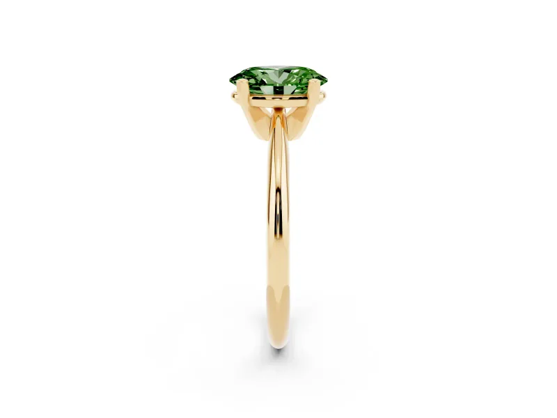 Fancy Green Oval Cut Diamond Solitaire Ring Set in Yellow gold with Prong Setting on a Plain Round Band