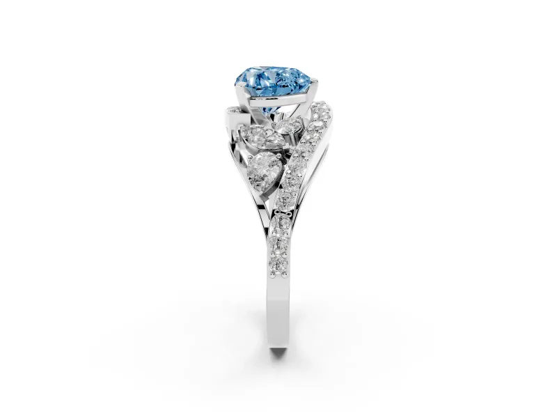 Fancy Blue Heart Cut Diamond Halo Ring Set in White gold with Marquise and Pavé Band in Prong Setting