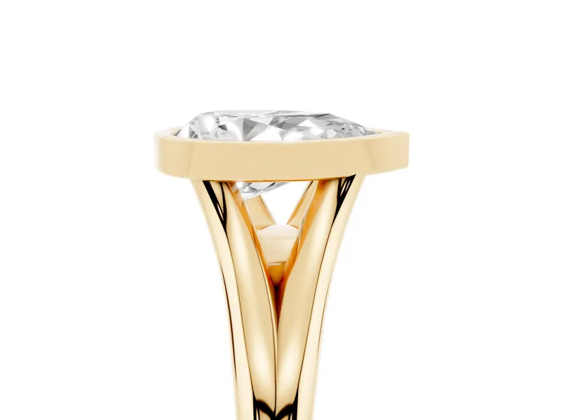Bezel Set Pear Cut Diamond Solitaire Ring Set in Yellow gold with Tapered Band