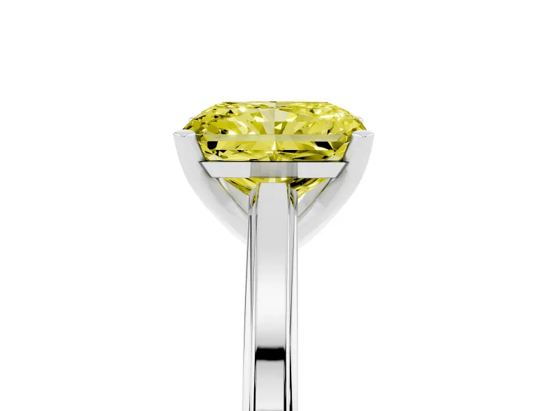 Fancy Yellow Radiant Cut Diamond Solitaire Ring Set in White gold with Prong Setting and Classic Band