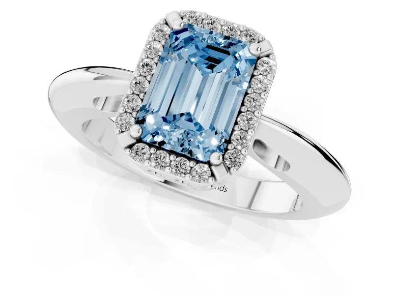 Fancy Blue Emerald Cut Diamond Halo Engagement Ring Set in White gold with Plain Split Shank and Prong Setting