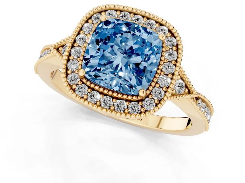 Fancy Blue Cushion Cut Diamond Halo Engagement Ring Set in Yellow gold with Milgrain Pavé Band