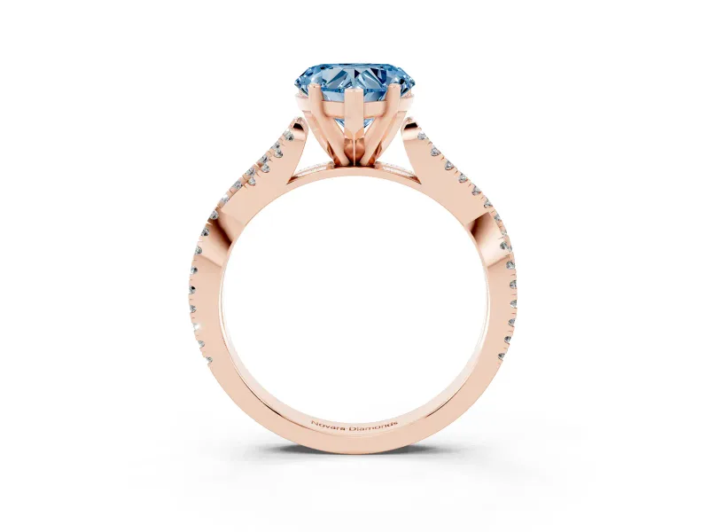 Fancy Blue Heart Cut Diamond Solitaire Engagement Ring Set in Rose gold with Twisted Pavé Band and Prong Setting