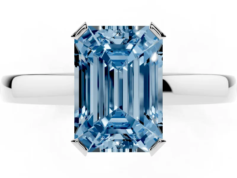 Fancy Blue Emerald Cut Diamond Solitaire Ring Set in Silver with Prong Head and Smooth Polished Band