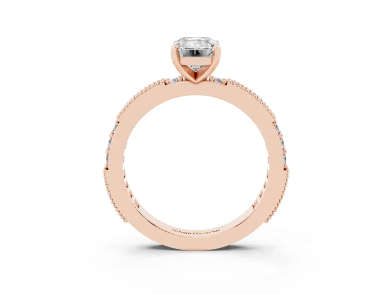 Emerald Cut Diamond Solitaire Ring Set in Rose gold with Slim Pavé Band and Prong Setting