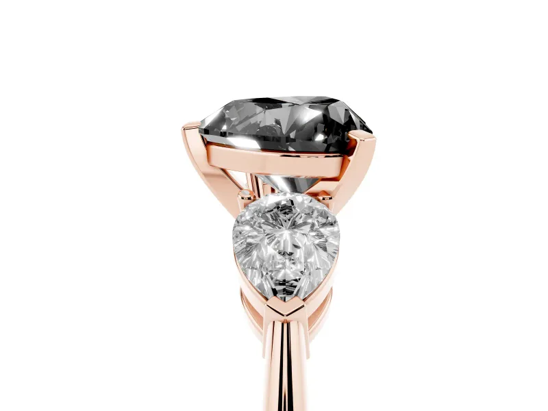 Fancy Black Three-Stone Heart Cut Diamond Ring Set in Rose gold with Pear Side Stones and Prong Setting
