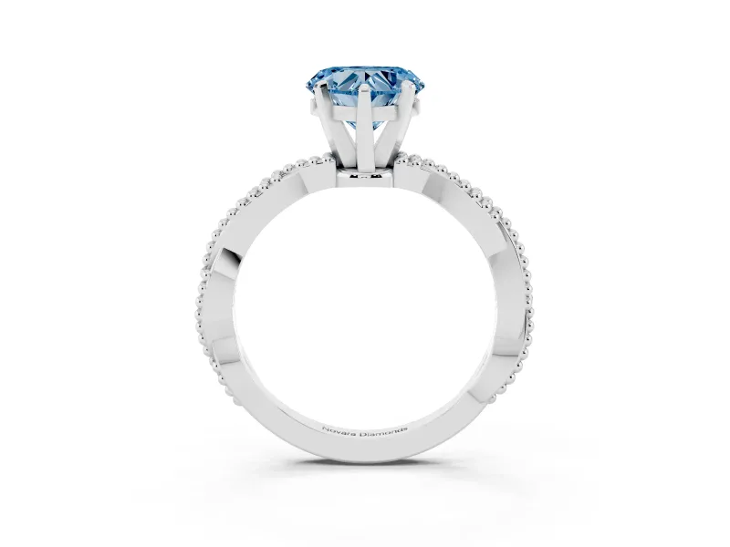 Fancy Blue Heart Cut Diamond Solitaire Ring Set in Silver with Twisted Band and Bead Prong Setting