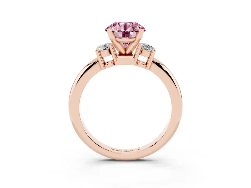 Fancy Pink Three-Stone Round Cut Diamond Ring Set in Rose gold with Prong Setting and Plain Band