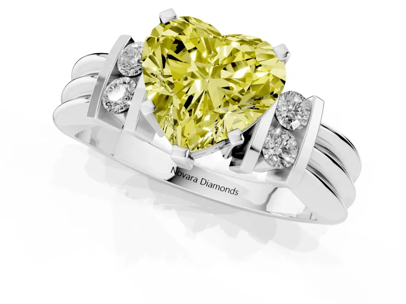 Fancy Yellow Three-Stone Heart Cut Diamond Channel Set Ring Set in Silver with Bar Prongs